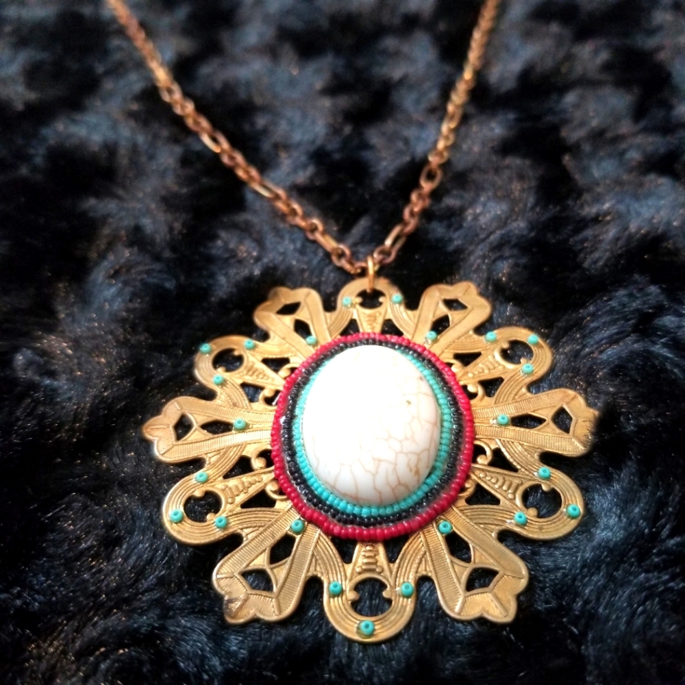 Brass Gold tone necklace with adorned pendant